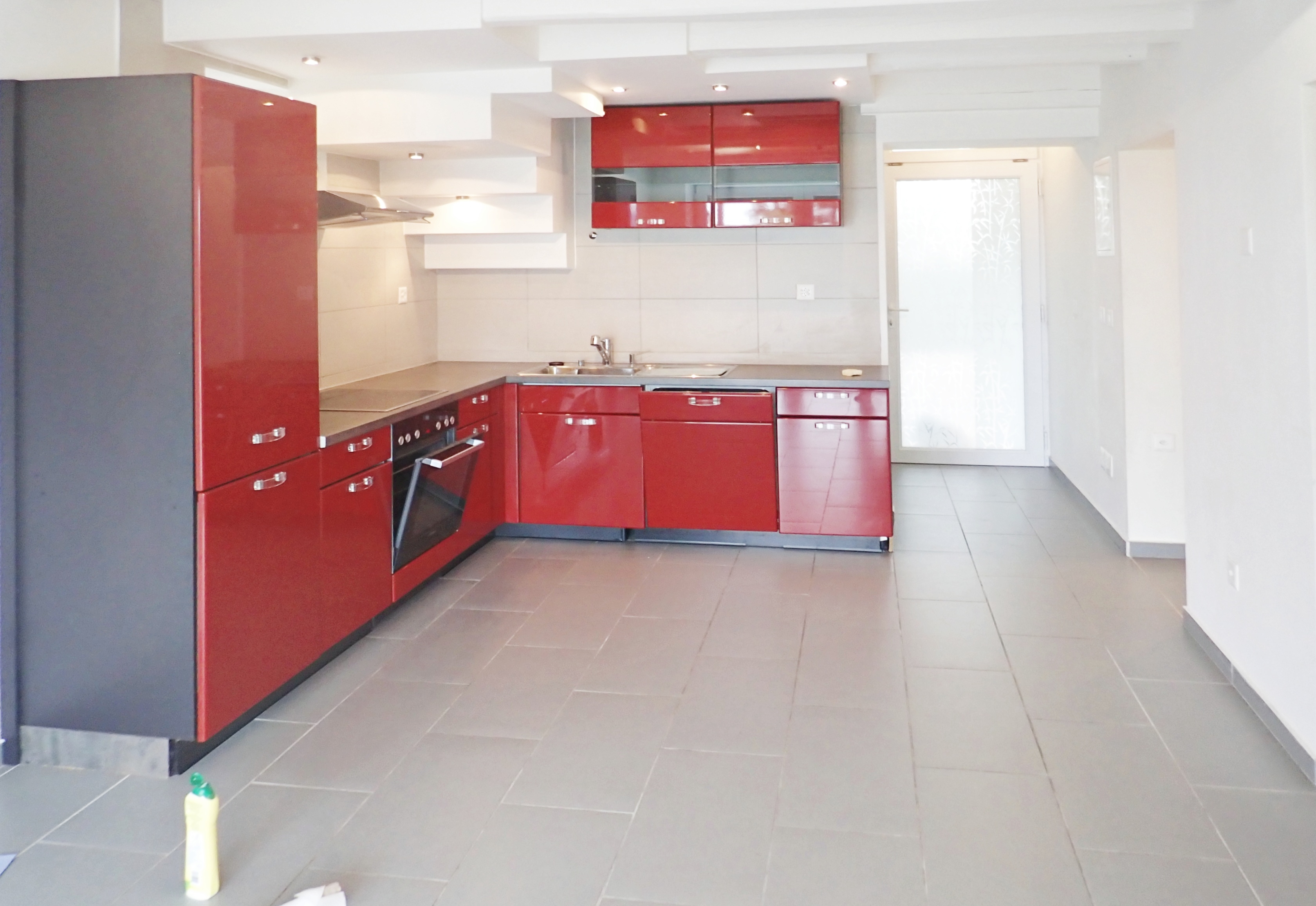 Bel appartement de 4.5p avec poutres apparentes et balcon dans ancienne ferme rénovée à Bussigny